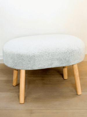 Grey Boquete footstool with natural wooden legs