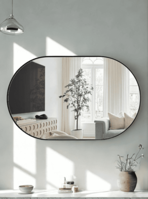 מראה אובלית קטנה מסגרת מתכת שחורה